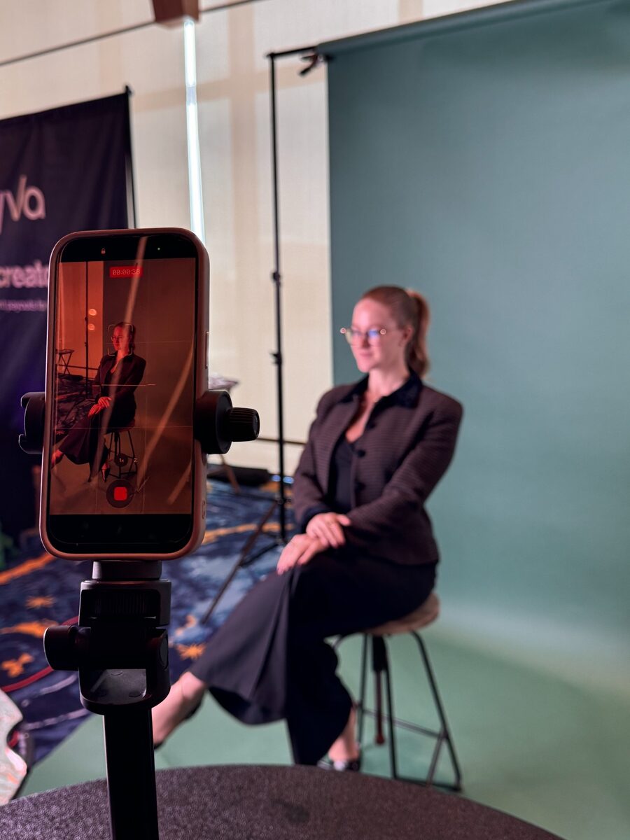 Behind the scenes of Shelby filming content at an event